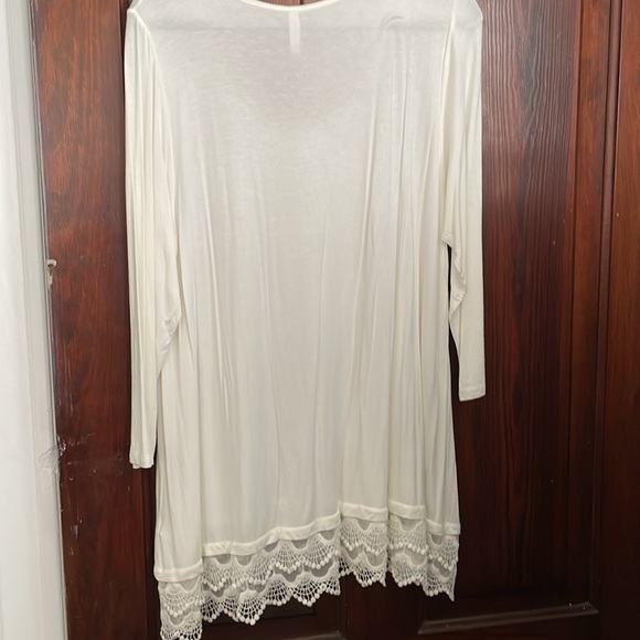 Beautiful white blouse. I am 5’9” and it reaches to mid thigh. Never worn. - Picture 3 of 4